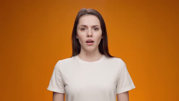 Upset Woman Slapping Hand on Face Feeling Helpless alt