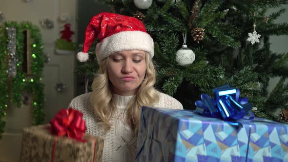 Christmas or New Year Angry Disgruntled Woman Throws Out Gift Boxes alt