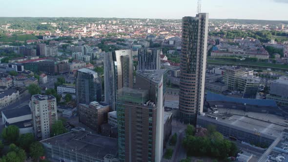 flight between modern buildings, energy saving, european skyscrapers alt