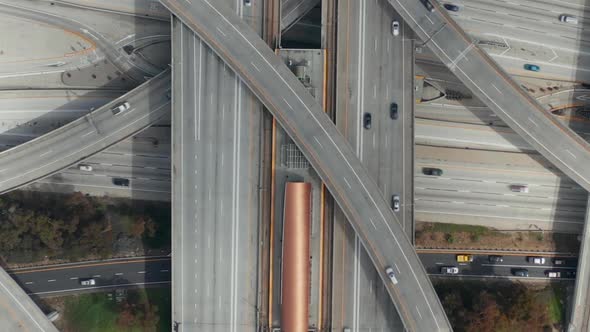 AERIAL: Spectacular Overhead Follow Shot of Judge Pregerson Highway Showing Multiple Roads, Bridges alt