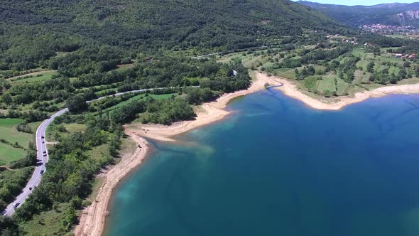 Flying above beautiful landscape of artificial lake of Peruca, Croatia alt