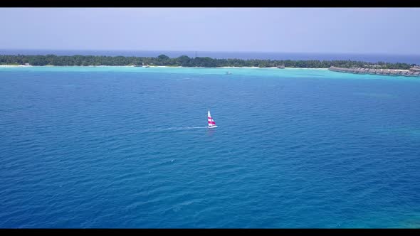 Aerial flying over tourism of paradise coastline beach wildlife by clear sea and white sand backgrou alt