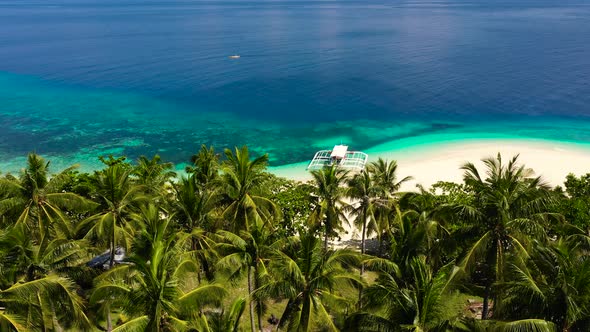 Tropical Island with a Beach and Palm Trees. Mahaba Island, Philippines. alt