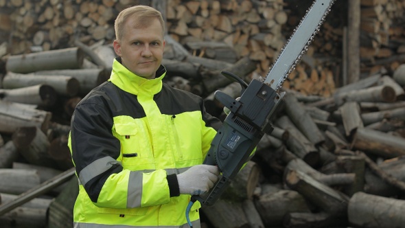 Lumberjack. Man Woodcutter with Small Saw. Choosing Electric Chainsaw, Sawn Logs, Firewood, Sawmill alt