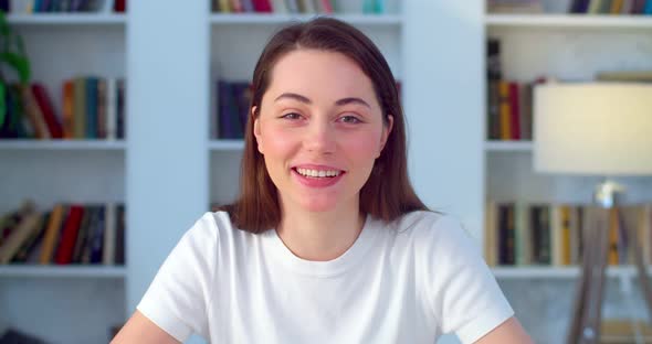 Webcam View of Happy Woman Talking To Friends Online Natural Light Slow Motion alt