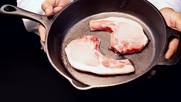 Chef Presents Pork Chops in a Skillet alt