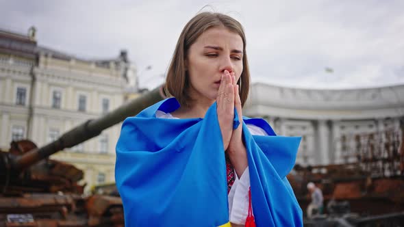 Woman Prays for Peace Putting Hands in Prayer Gesture alt