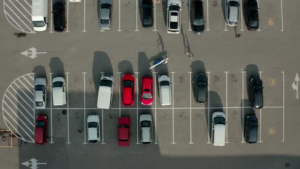 Top Aerial Drone View Car Driving and Parked Free Parking Space. View From Above Flying Drone Cars alt