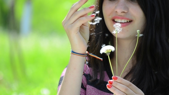 Young Lady Playing with Dandelions 01