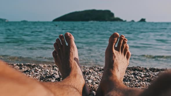 POV Young Male Barefoot Feet on the Pebble Beach By the Sea Landscape alt