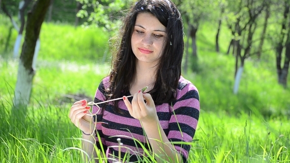 Young Lady Playing with Dandelions 05