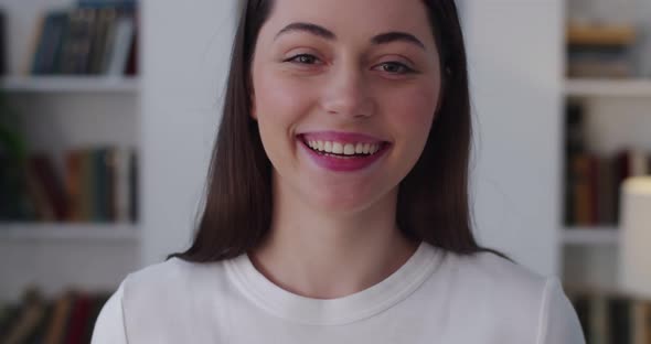 Close Up Portrait of Cheerful Girl Posing Indoor Home Background Slow Motion alt