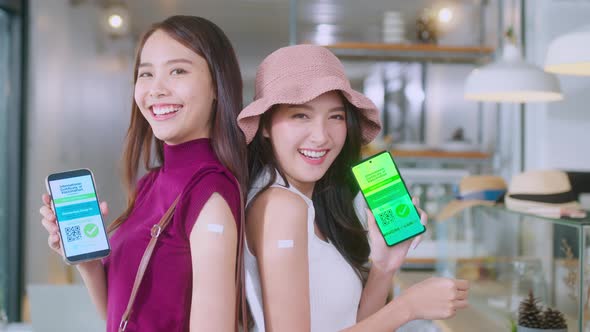 Asian female cheerful smiling teenager hand gesture point show vaccine brand alt