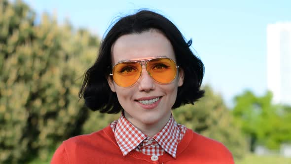 Beautiful Girl Portrait in Sunglasses alt