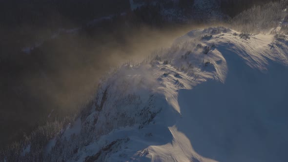 Aerial View From Airplane of Fresh Snow Covered Canadian Mountain Landscape alt