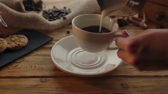 Final Preparing of Latte or Cappuccino Coffee for Delicious Breakfast alt