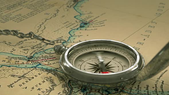 Detailed Old Compass On A Vintage Map