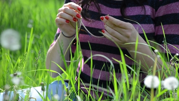 Young Lady Playing with Dandelions 03