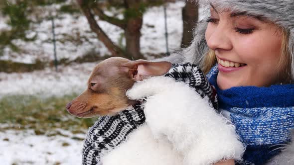Woman with Dog Outside in Winter alt