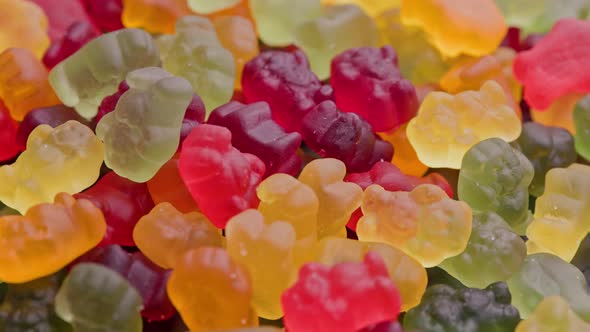 Full Frame Looped Spinning Background of Colorful Jelly Bear Candies