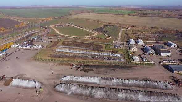 Aerial Shot Large Vineyard Fields Among Mountains alt