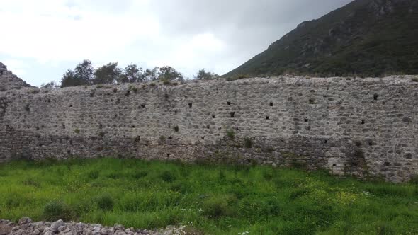 Spectacular aerial view panorama curve flight drone footage in castle ruins of a byzantine fortress alt