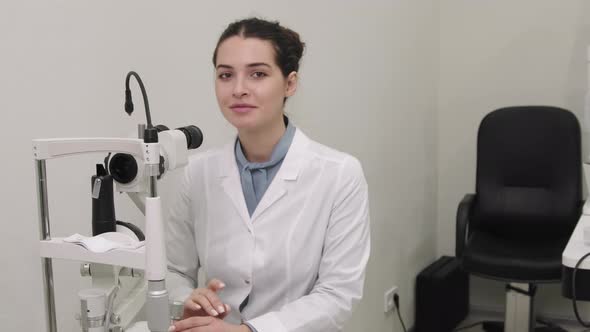 Beautiful Female Oculist At Workplace alt