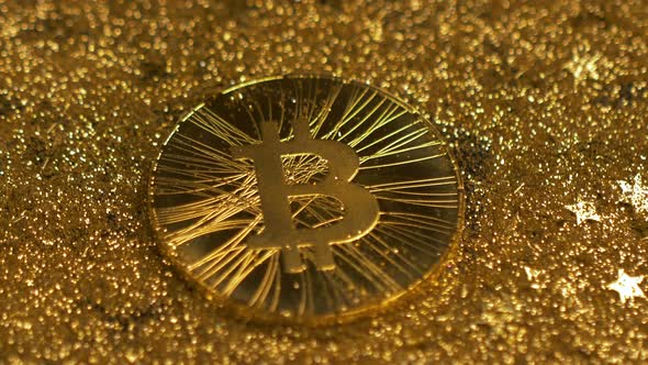 Macro Bright Light Ray Moves Above Popular Golden Bitcoin Model alt