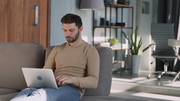 A successful man reacts emotionally to the news alt