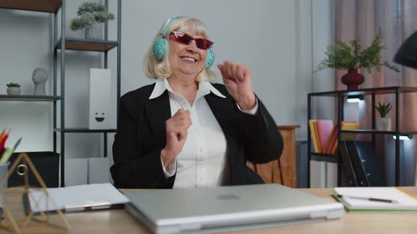 Happy Senior Business Woman Dancing Victory Dance Celebrating Weekend Holiday Success Win in Office alt
