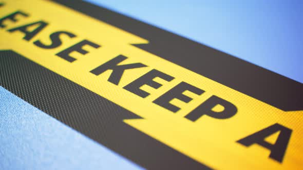 Social distancing floor signs during the coronavirus pandemic.Yellow visual cues alt