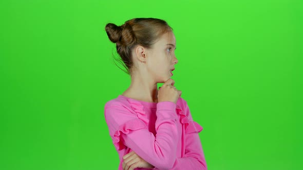 Baby Thinks and She Comes Up with an Idea. Green Screen. Slow Motion alt