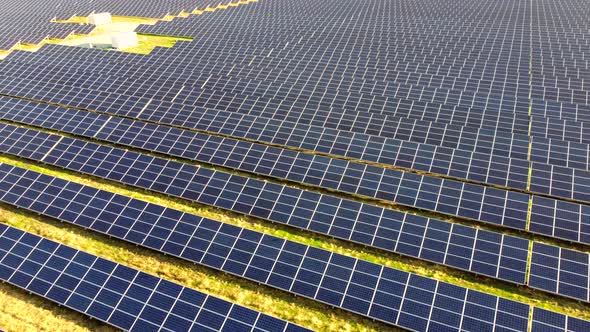 Aerial Drone View Flight Over Solar Power Station Panels alt