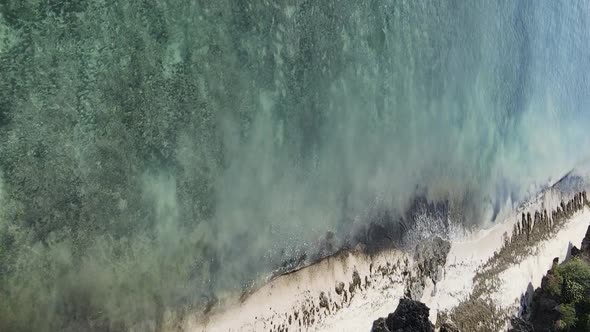 Vertical Video of the Ocean Near the Coast of Zanzibar Tanzania Aerial View alt