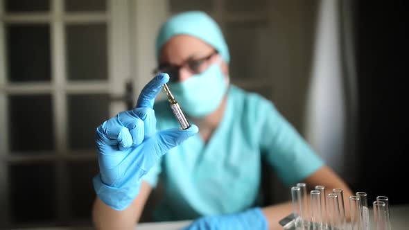 Doctor holding a recipient with the coronavirus COVID-19 vaccine