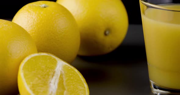 Close Up Shot Of Citrus - Oranges And Juice.