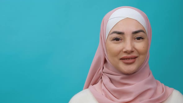 Portrait Young Arab Muslim Woman in Traditional Hijab Looking Straight to Camera and Smiling