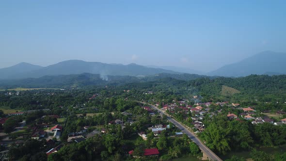 Vang Vieng city in Laos seen from the sky alt
