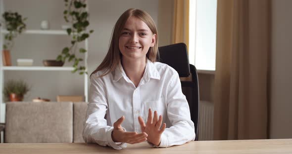 Portrait of Happy Smiling Teenage Girl or Business Woman Wearing Shirt Sitting in Office Room at alt