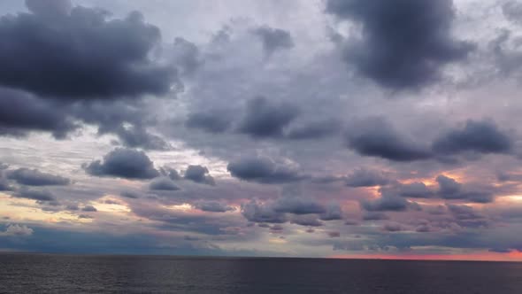 Cloudy Sunset Over the Sea Aerial View 4 K alt