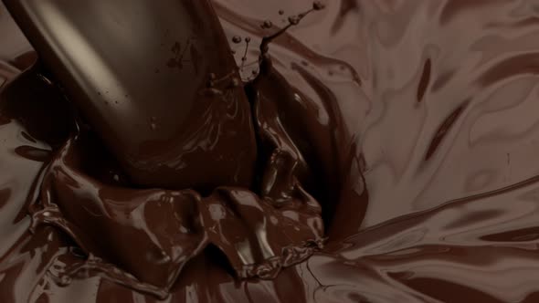 Super Slow Motion Shot of Pouring Melted Chocolate Into Vortex at 1000 Fps alt