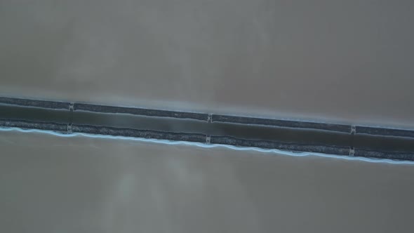 Alykes the Hellenic saltworks located outside of Mesolongi in Greece. Drone footage with the clouds alt