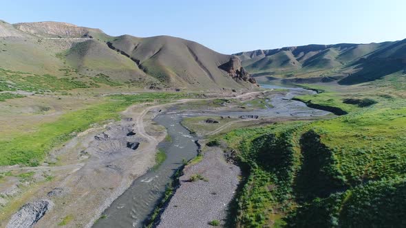 Flight over Mountainous Terrain. 4k. alt