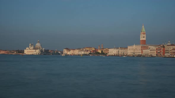 Venetian Lagoon, San Marco Tower and Basilica Santa Maria della Salute in Venice Timelapse alt