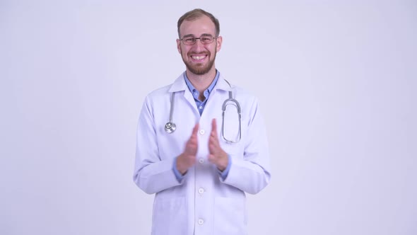 Happy Bearded Man Doctor Clapping Hands