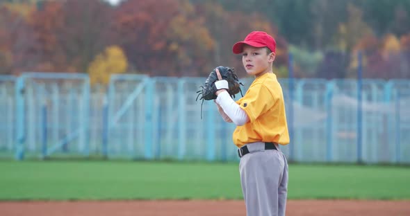 Baseball at School the Pitcher Pitches Fastball Toward Batter Young Boy Throwing the Ball Slow alt