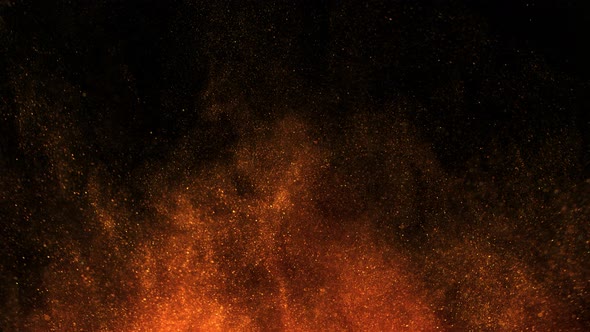 Super Slow Motion Shot of Golden Glitter Background Isolated on Black at 1000 Fps alt