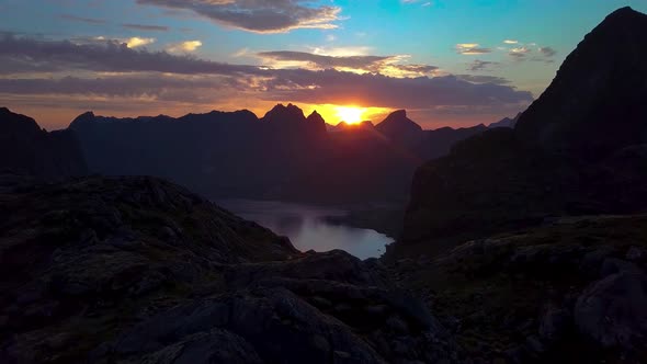 Flying Over the Mountains at Dawn alt