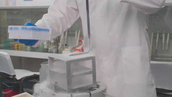 Laboratory Samples are Taken From a Liquid Nitrogen Fridge alt