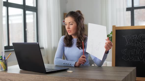 Teacher with Tutorial Having Online Class of Arts alt